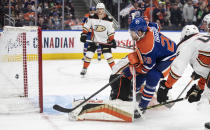 Anaheim Ducks goalie John Gibson (36) is scored on by Edmonton Oilers' Leon Draisaitl (29) during the second period of an NHL hockey game Saturday, April 1, 2023, in Edmonton, Alberta. (Jason Franson/The Canadian Press via AP)