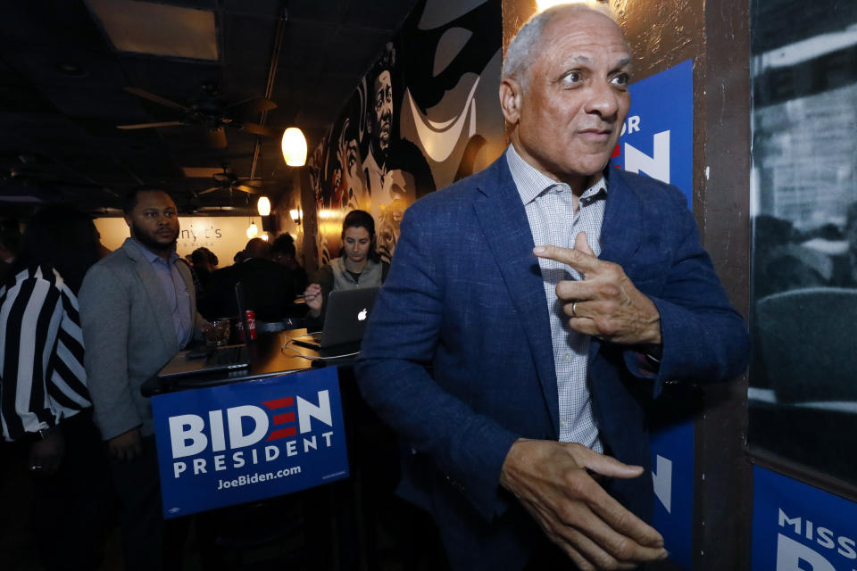 Mike Espy readies to speak with reporters in Jackson, Miss., after winning the Democratic nomination for a U.S. Senate seat in Mississippi, Tuesday, March 10, 2020. After his victory Tuesday, he will face Republican incumbent U.S. Sen. Cindy Hyde-Smith and Libertarian candidate Jimmy Edwards in November. (AP Photo/Rogelio V. Solis)