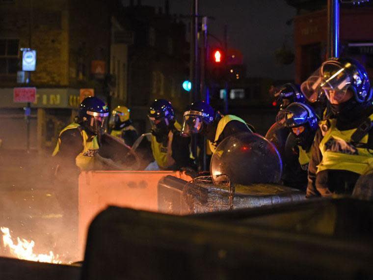 Rashan Charles protest: Riot police called to Dalston as fireworks and bottles launched at officers