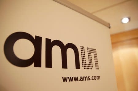 FILE PHOTO: The logo of the multinational semiconductor manufacturer AMS (Austria Mikro Systeme) is seen during a annual news conference, in Zurich, Switzerland February 6, 2018. REUTERS/Moritz Hager