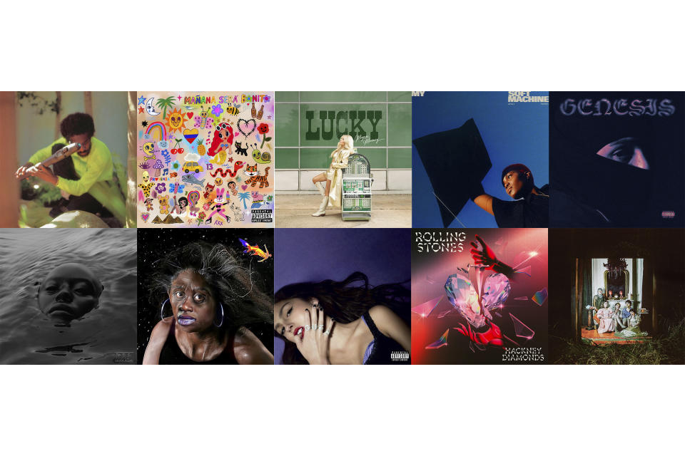 This combination of photos shows album art for, top row from left, “New Blue Sun” by Andre 3000, “Mañana Será Bonito” by Karol G, "Lucky" by Megan Moroney, "My Soft Machine " by Arlo Parks, "Genesis" by Peso Pluma, second row from left, "Raven" by Kelela, "Sundial" by Noname, "GUTS" by Olivia Rodrigo, "Hackney Diamonds" by The Rolling Stones and "Rat Saw God" by Wednesday. (Epic/Universal/Sony/Transgressive/Douple P/Warp/AWAL/Geffen/Universal/Dead Oceans via AP)