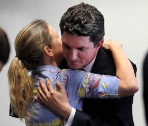 Winners and losers: Louise Pratt embraces Scott Ludlam. Picture: Nic Ellis/The West Australian