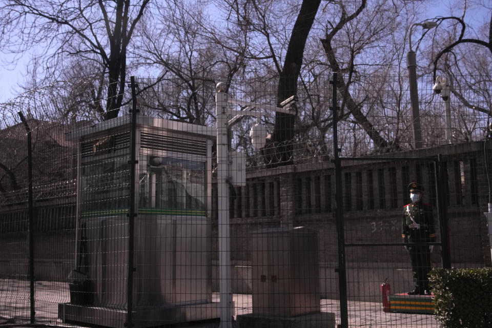 A Chinese paramilitary policeman stands guard along the fences around the Russian Embassy in Beijing on Tuesday, March 1, 2022. As the West condemns Russia, President Vladimir Putin has vocal supporters in China, where the ruling Communist Party tells its people they are a fellow target of U.S.-led harassment. Public sentiment largely reflects the stance of a ruling party that is the closest thing Putin has to a major ally: The war should stop but the United States is to blame. (AP Photo/Ng Han Guan)