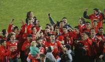 Chile players celebrate after defeating Argentina in their Copa America 2015 final soccer match at the National Stadium in Santiago, Chile, July 4, 2015. REUTERS/Ueslei Marcelino