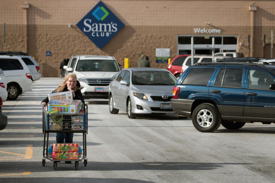 STREAMWOOD, IL - JANUARY 12:  A shopper stocks up on merchandise at a Sam's Club store on January 12, 2018 in Streamwood, Illinois. The store is one of more 60 sheduled to close nationwide by the end of January.  (Photo by Scott Olson/Getty Images)