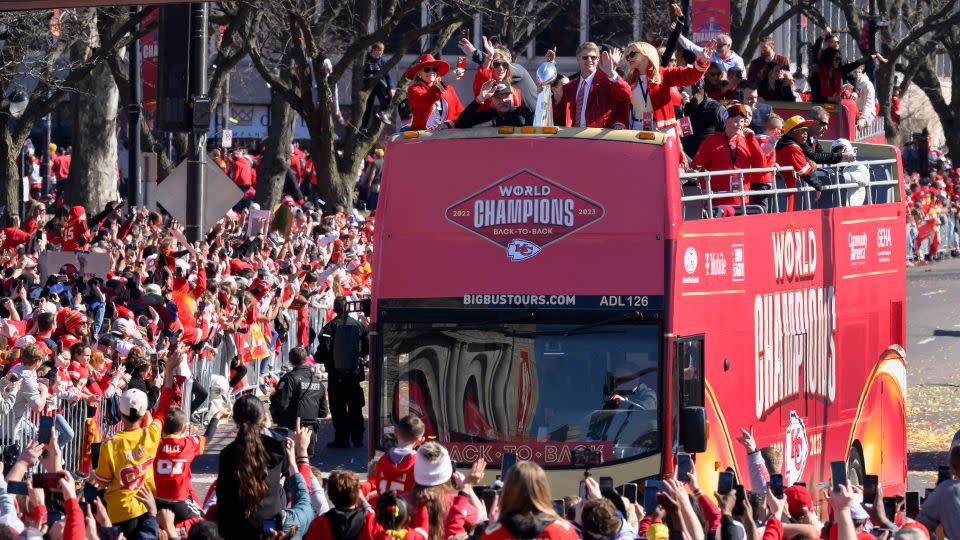 Kansas City Chiefs chairman and CEO Clark Hunt holds the Vince Lombardi Trophy as their bus arrives at the victory rally in Kansas City, Mo., Wednesday, Feb. 14, 2024. - Reed Hoffmann/AP