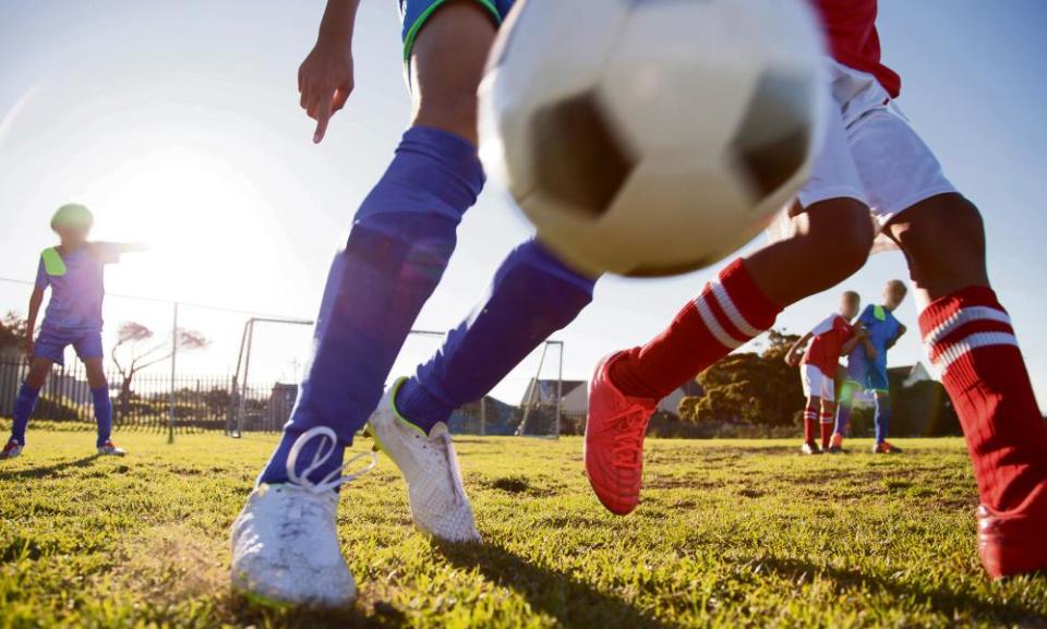 Kids playing football