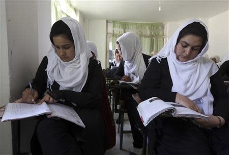Students attend class at a school run by Aid Afghanistan for Education in Kabul May 13, 2014. REUTERS/Omar Sobhani