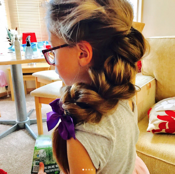 Nate Denton runs an Instagram account showcasing the unique hairstyles he creates for his daughter, Nevaeh. (Photo: Instagram/DetanglingDad)