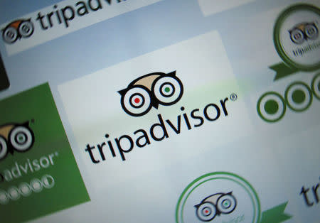 FILE PHOTO: The logo for a travel website company TripAdvisor Inc is shown on a computer screen in this illustration photo in Encinitas, California May 3, 2016. REUTERS/Mike Blake/File Photo