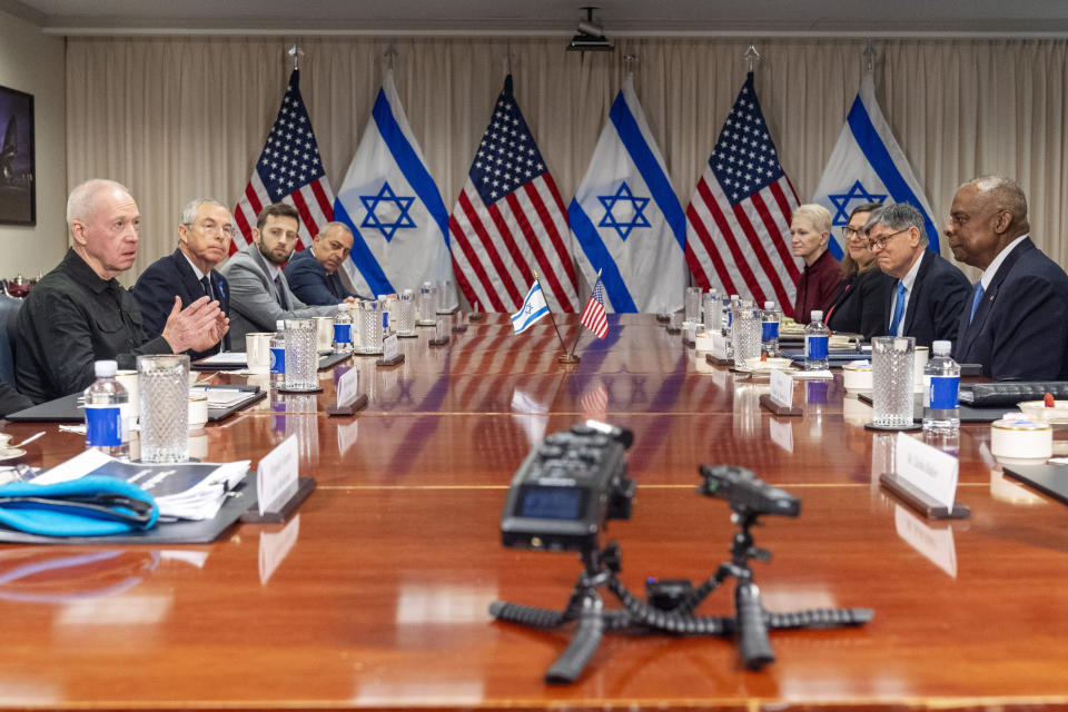 Israeli Defense Minister Yoav Gallant, at far left, speaks while meeting with Defense Secretary Lloyd Austin, across table at far right, at the Pentagon, Tuesday, March 26, 2024, in Washington. (AP Photo/Jacquelyn Martin)