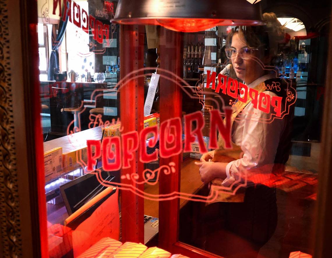 Lyncee Smith works the concession stand at the Isis Theatre on Tuesday, August 9, 2022, in the Fort Worth Stockyards. The historic theatre reopened last year after being closed since 1988.