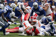 Kansas City Chiefs running back Jerick McKinnon (1) is flipped in front of Indianapolis Colts safety Rodney Thomas II (25) during the second half of an NFL football game, Sunday, Sept. 25, 2022, in Indianapolis. (AP Photo/Michael Conroy)