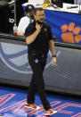 Louisville Head Coach Jeff Walz directs his team during the championship of Atlantic Coast Conference NCAA women's college basketball game in Greensboro, N.C., Sunday, March 7, 2021. (AP Photo/Ben McKeown)