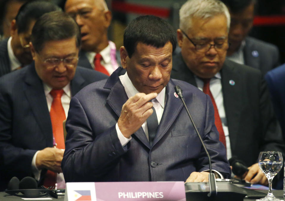 Philippine President Rodrigo Duterte listens to speeches during the ASEAN Plus China Summit in the ongoing 33rd ASEAN Summit and Related Summits Wednesday, Nov. 14, 2018 in Singapore. (AP Photo/Bullit Marquez)