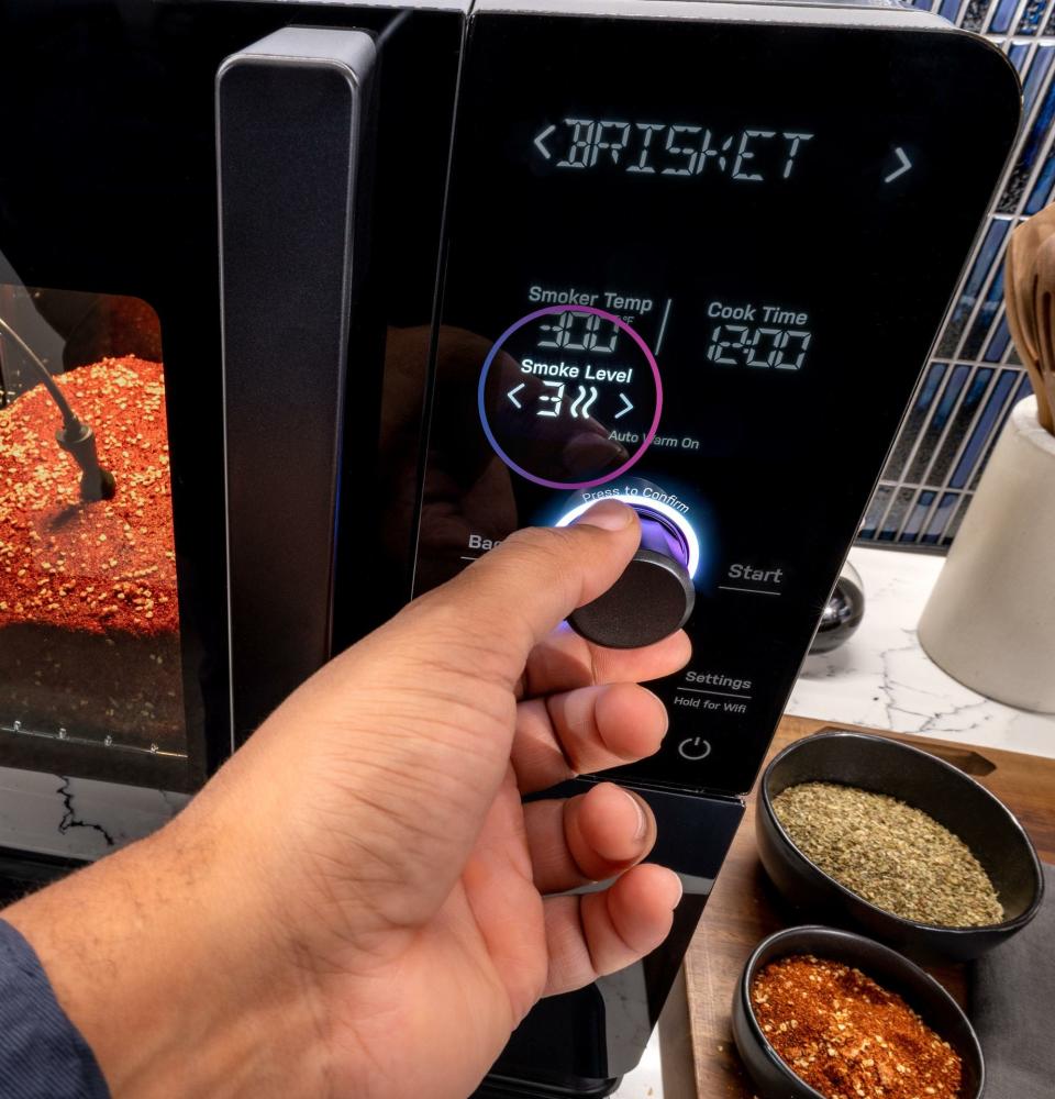 The GE Profile Smart Indoor Smoker has six preset food settings: brisket, pork ribs, pork butt, chicken wings, chicken breast and salmon. But you can customize your cooking, too.