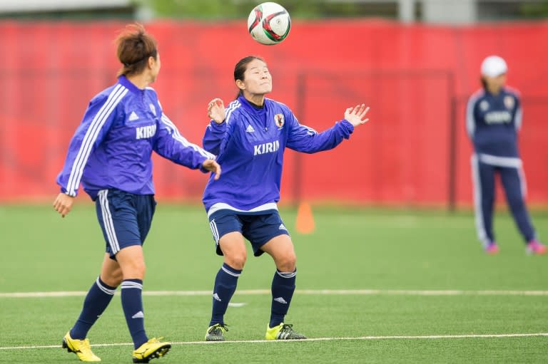 Japan's Homare Sawa heads the ball during a FIFA Women's World Cup training session in Edmonton, Canada, on June 29, 2015