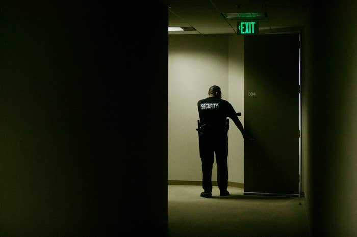 security guard checking around door