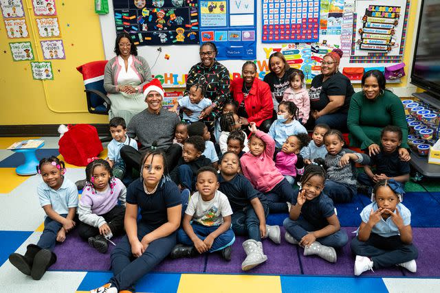 <p>The Obama Foundation</p> Barack Obama poses with the pre-K class at Parkside Community Academy in Chicago on Dec. 12, 2023