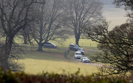 Official government cars make their way through the grounds of Chequers, the official country residence of the Prime Minister, near Aylesbury, Britain, February 22, 2018. REUTERS/Darren Staples