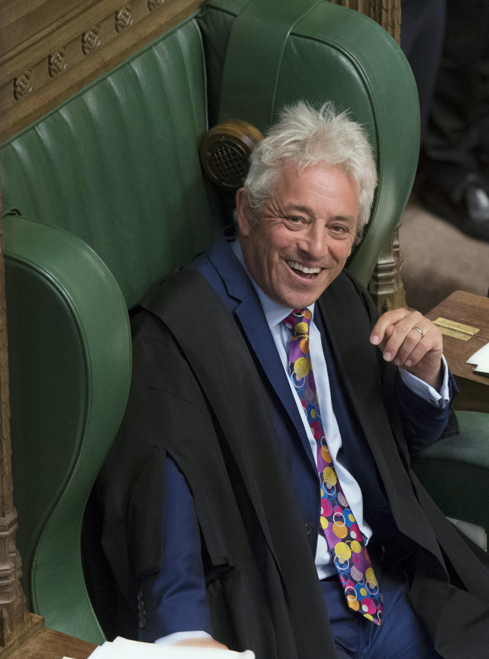 FILE - In this Monday, Sept. 9, 2019 file photo released by the House of Commons, speaker of the House John Bercow laughs after announcing he will be standing down, in the House of Commons in London. The speaker of Britain’s House of Commons has become a global celebrity for his loud ties, even louder voice and star turn at the center of Britain’s Brexit drama. On Thursday Oct. 31, 2019, he is stepping down after 10 years in the job. (Jessica Taylor/House of Commons via AP, File)