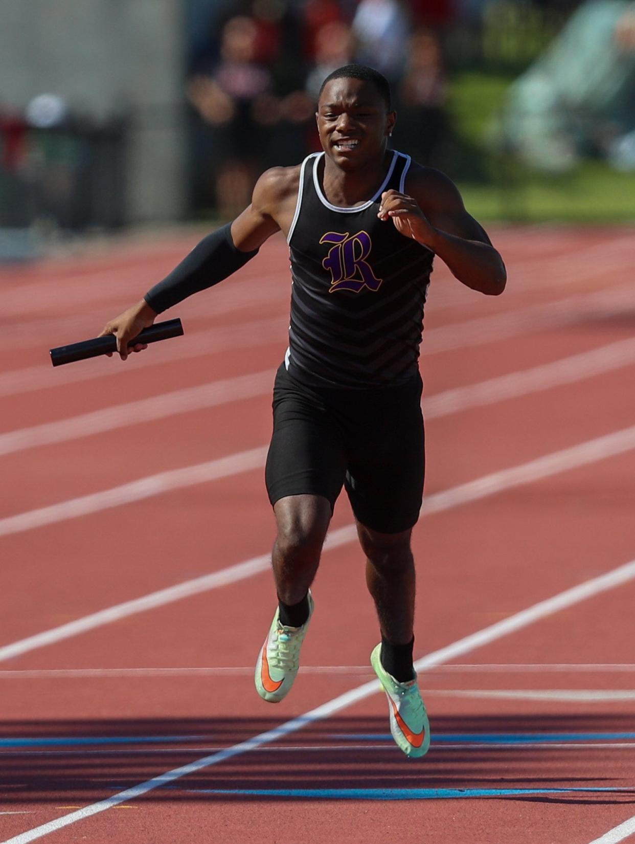 Reynolsburg senior Markez Gillam crosses the finish line to give the 800-meter relay a fourth-place finish in the Division I state meet June 4 at Ohio State.
