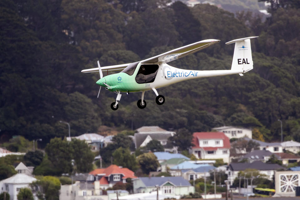 The ElectricAir plane is on approach before landing at Wellington Airport in Wellington, New Zealand, Monday, Nov. 1, 2021. Seeking to highlight the potential for green aviation as a pivotal climate change conference opened in Glasgow, New Zealand pilot Gary Freedman made the first-ever flight over Cook Strait in an electric plane. (Mark Mitchell/New Zealand Herald via AP)