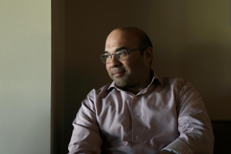 Farhan Zaidi, the San Francisco Giants' president of baseball operations, speaks to reporters at Oracle Park in San Francisco, Thursday, Feb. 6, 2020. (AP Photo/Jeff Chiu)