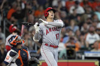 Los Angeles Angels' Shohei Ohtani (17) reacts after fouling a pitch against the Houston Astros during the sixth inning of a baseball game Saturday, July 2, 2022, in Houston. (AP Photo/David J. Phillip)