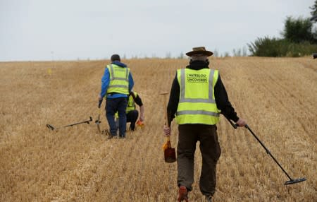 Army veterans and archeologists dig as part of archaeological research campaign called "Waterloo Uncovered" in Waterloo