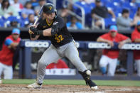 Pittsburgh Pirates' Henry Davis is hit by a pitch as he bats during the third inning of a baseball game against the Miami Marlins, Saturday, March 30, 2024, in Miami. (AP Photo/Wilfredo Lee)