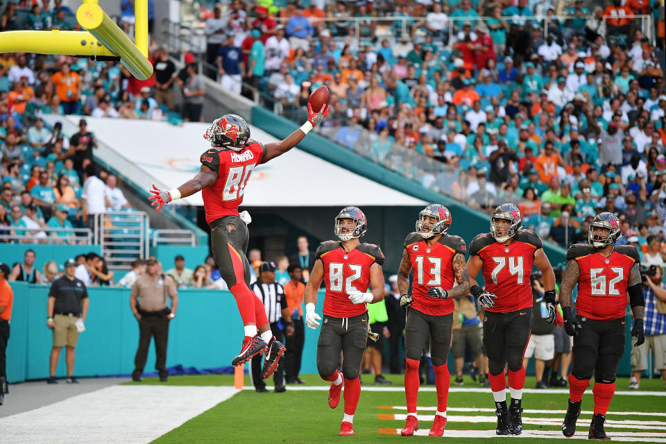 <p>O.J. Howard #80 of the Tampa Bay Buccaneers celebrates after scoring a touchdown during the second quarter against the Miami Dolphins at Hard Rock Stadium on November 19, 2017 in Miami Gardens, Florida. (Photo by Mark Brown/Getty Images) </p>
