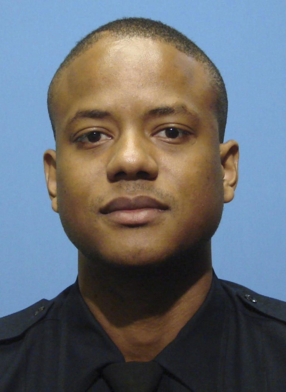 CORRECTS THAT RAYAM HAS NOT BEEN SENTENCED - FILE - This undated file photo provided by the Baltimore Police Department shows Jemell Rayam. The only disgraced unit detective yet to receive sentencing is Rayam, Momodu Gondo's former police partner. Rayam, who also cooperated with the government, testified that Gondo, who was shot multiple times outside his home in 2006, just two months out of the police academy, was actually shot by fellow drug dealers. (Baltimore Police Department via AP, File)