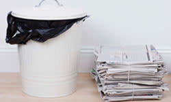 <b>Keep stacks of recycling newspaper and cardboard outside of — but not too close to — your home, and periodically dust your recycling bins with a boric acid powder.</b> Polka Dot/<a class="link " href="http://www.thinkstockphotos.com" rel="nofollow noopener" target="_blank" data-ylk="slk:Thinkstock;elm:context_link;itc:0;sec:content-canvas">Thinkstock</a>