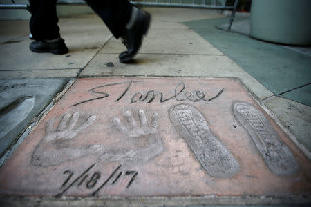The handprints, footprints and signature of late Marvel Comics co-creator Stan Lee are pictured in the forecourt of the TCL Chinese theatre in Los Angeles, California, U.S., November 12, 2018. REUTERS/Mario Anzuoni