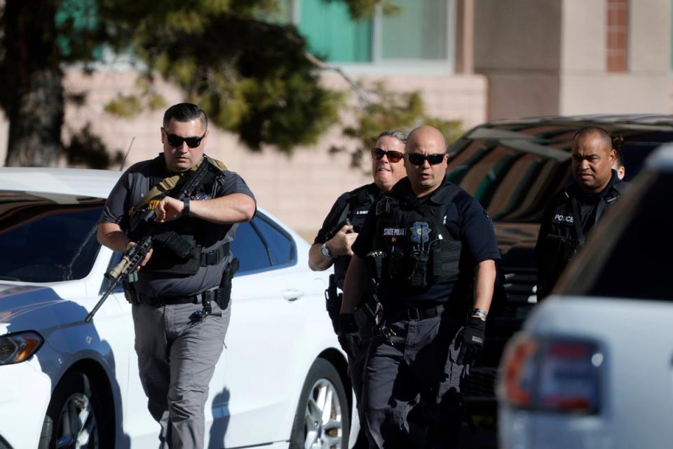 State police officers head to the University of Nevada (AP)