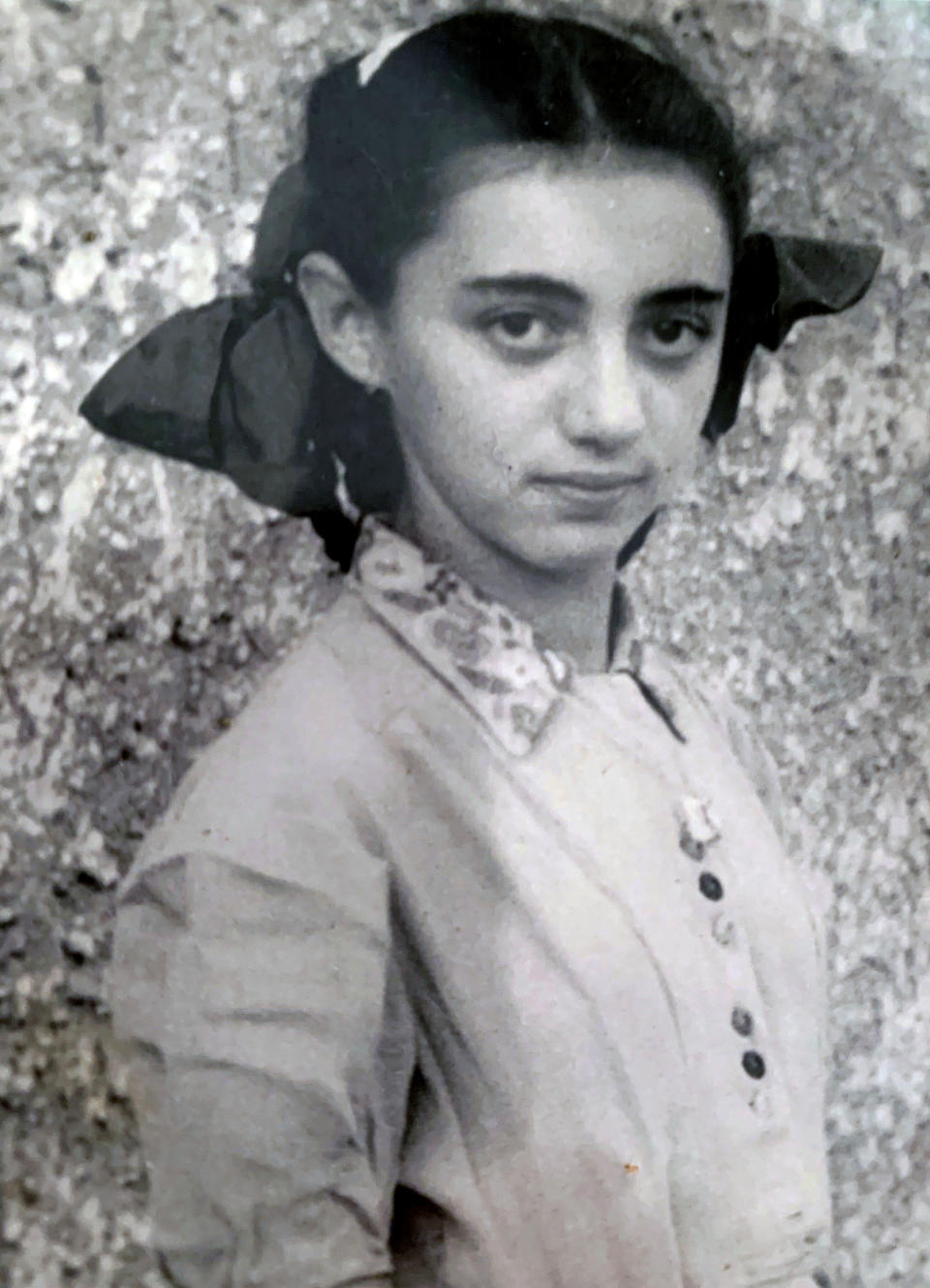 In this 1948 photo, provided by Ruth Brandspiegel, Brandspiegel is photographed in the Hallein Displaced Persons Camp in Austria following World War II. She and her parents resettled in the United States after leaving the camp. Brandspiegel recently became reunited, after more than 70 years, with fellow Holocaust survivor Israel “Sasha” Eisenberg, whom she met at the displaced camp in Austria where they became friends. (Courtesy of Ruth Brandspiegel via AP)