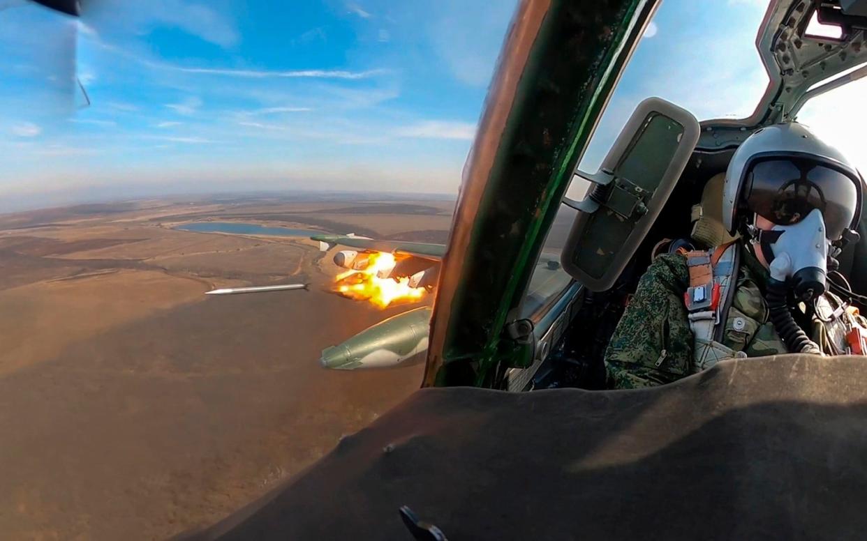 A Su-25 ground attack jet of the Russian air force firing rockets during a mission over Ukraine