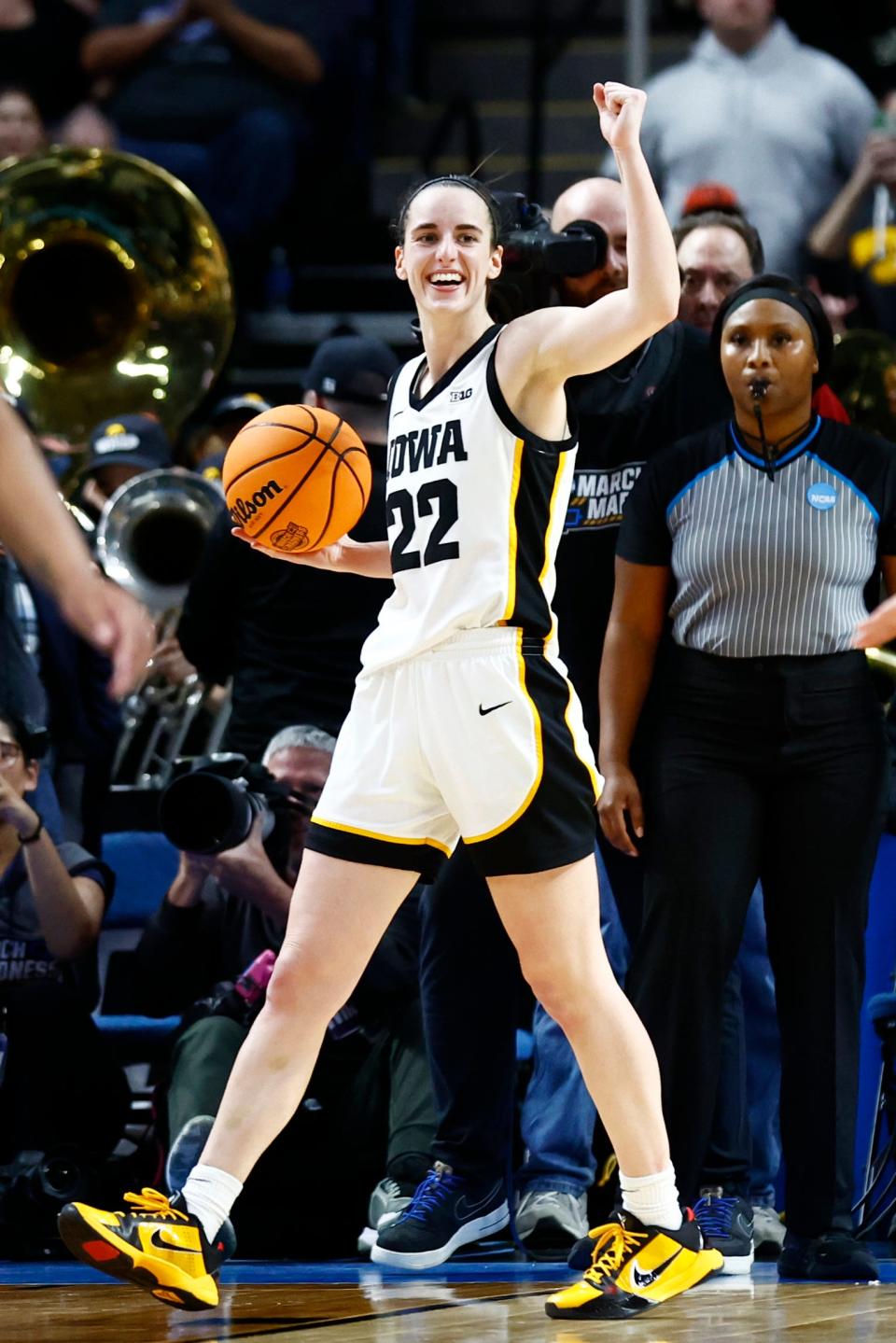 Caitlin Clark celebrates after defeating LSU in the finals of the Albany Regional in the 2024 NCAA Tournament at MVP Arena.