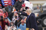 President Donald Trump arrives for a campaign rally Tuesday, Oct. 27, 2020, in Lansing, Mich. (AP Photo/Carlos Osorio)