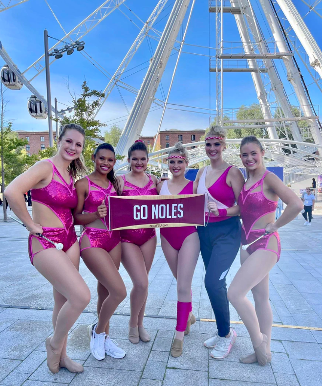 Florida State University students pose at the 2023 World Baton Twirling Championship in Liverpool, England. (Left to right: Mikayla Schuller, Jasmine Evans, Madison Frisby, Samantha Merigliano, Lexie Stade, Kylee Saltsman)