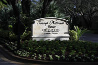 FILE - This Feb. 2, 2019 file photo shows the entrance to Trump National Golf Club in Jupiter, Fla Trump is returning to a family business ravaged by pandemic shutdowns, with revenue plunging more than 40 percent at his Doral golf property, his Washington hotel and at both his Scottish resorts. Trump’s financial disclosure released as he left office this week was just the latest bad news for his financial empire after banks, brokerages and golf organizations announced they were cutting ties with his company following the storming of the Capitol this month by his political supporters (AP Photo/Manuel Balce Ceneta, File)