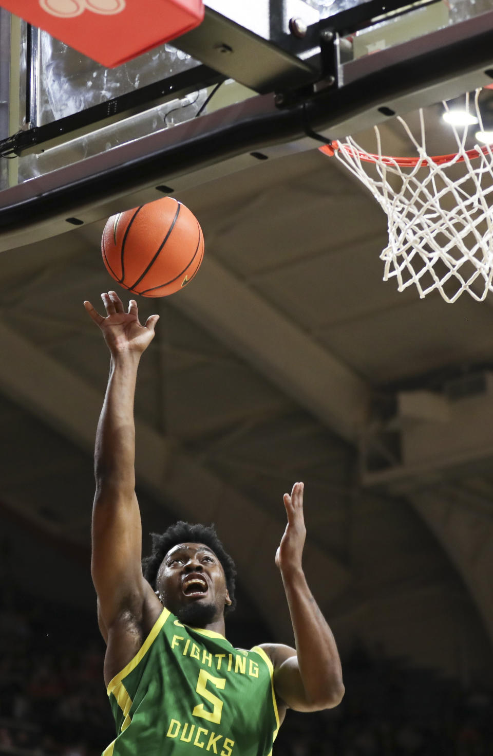 Oregon guard Jermaine Couisnard shoots against Oregon State during the second half of an NCAA college basketball game Saturday, Feb. 17, 2024, in Corvallis, Ore. Oregon won 60-58. (AP Photo/Amanda Loman)