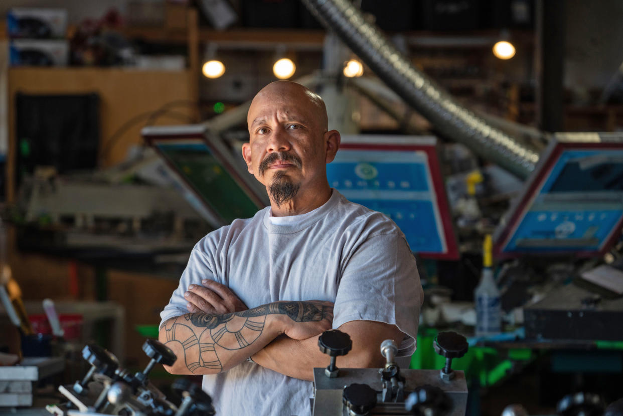 René Quiñonez owns Movement Ink in Oakland, Calif. (J. Justin Wilson / Institute for Justice)