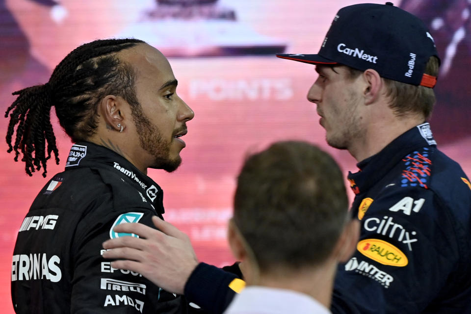 Pictured left, Mercedes driver Lewis Hamilton chats with Red Bull rival Max Verstappen.