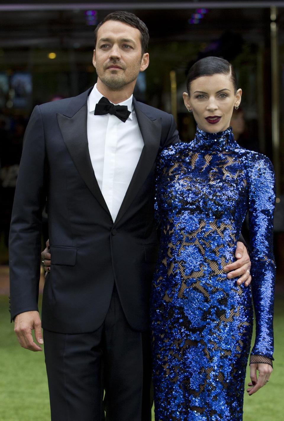 FILE - In this May 14, 2012 file photo, actress Liberty Ross with director Rupert Sanders pose for the media at the World Premiere of the film, "Snow White and the Huntsman," at a cinema in central London. Ross filed for divorce on Friday, Jan. 28, 2013 in Los Angeles, roughly five months after it was revealed that Sanders had engaged in a brief affair with actress Kristen Stewart. (AP Photo/Alastair Grant, File)