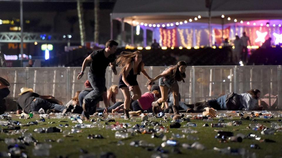 PHOTO: People run from the Route 91 Harvest country music festival after apparent gun fire was heard, Oct. 1, 2017, in Las Vegas. (David Becker/Getty Images, FILE)