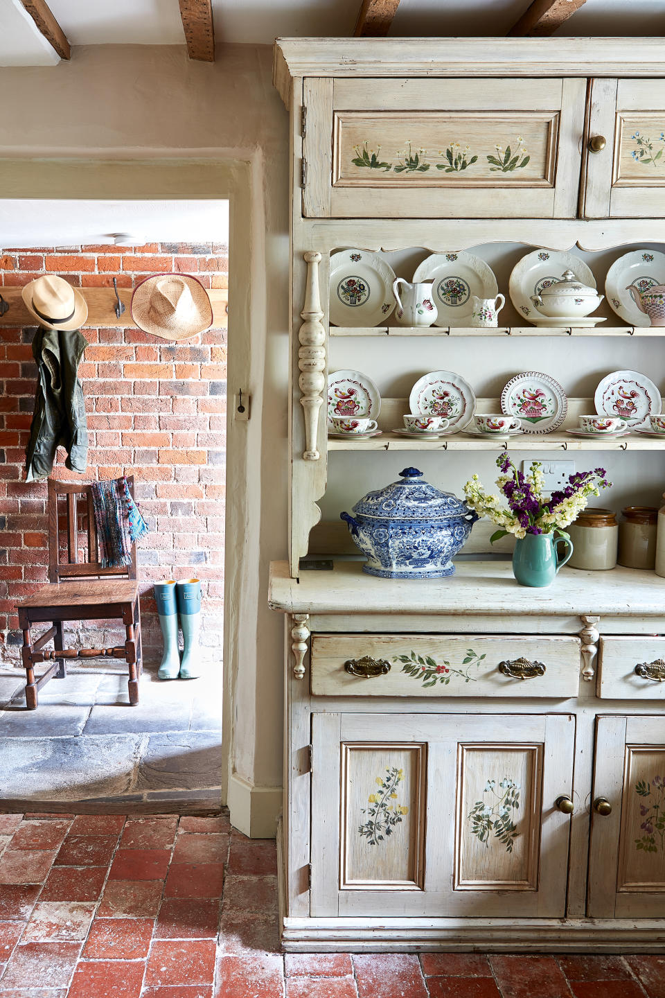 3. ADD BRING RUSTIC CHARM WITH AN ANTIQUE PAINTED PIECE