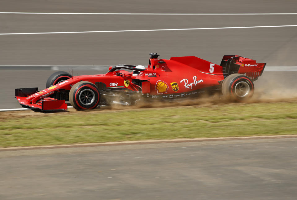 Ferrari driver Sebastian Vettel of Germany steers his car during the qualifying session session for the British Formula One Grand Prix at the Silverstone racetrack, Silverstone, England, Saturday, Aug. 1, 2020. The British Formula One Grand Prix will be held on Sunday. (Andrew Boyers/Pool via AP)