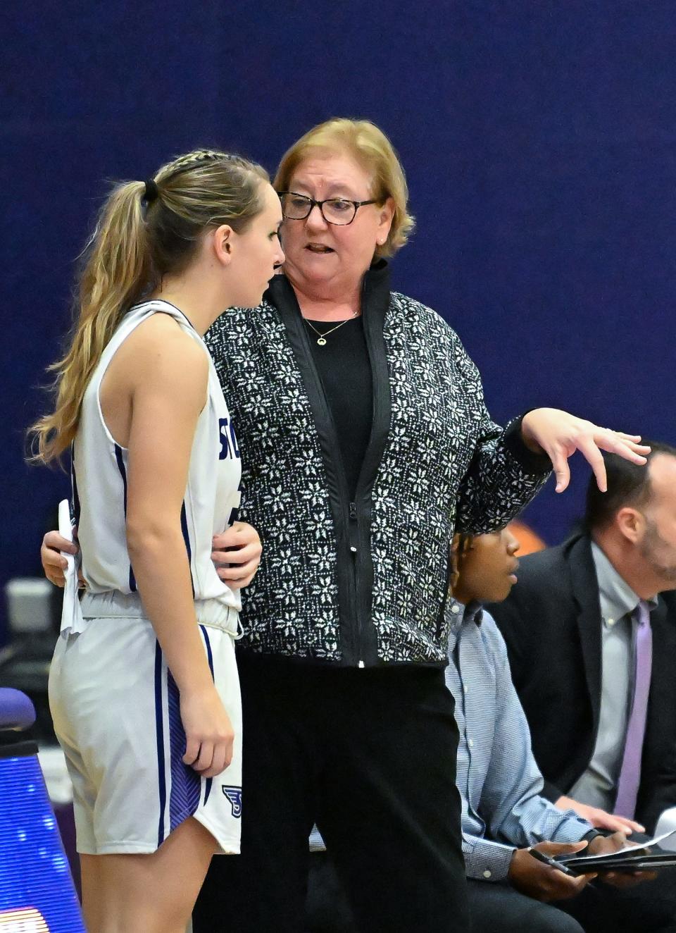 Stonehill College women's basketball coach Trisha Brown broke the record for most games coached in program history in 2024.